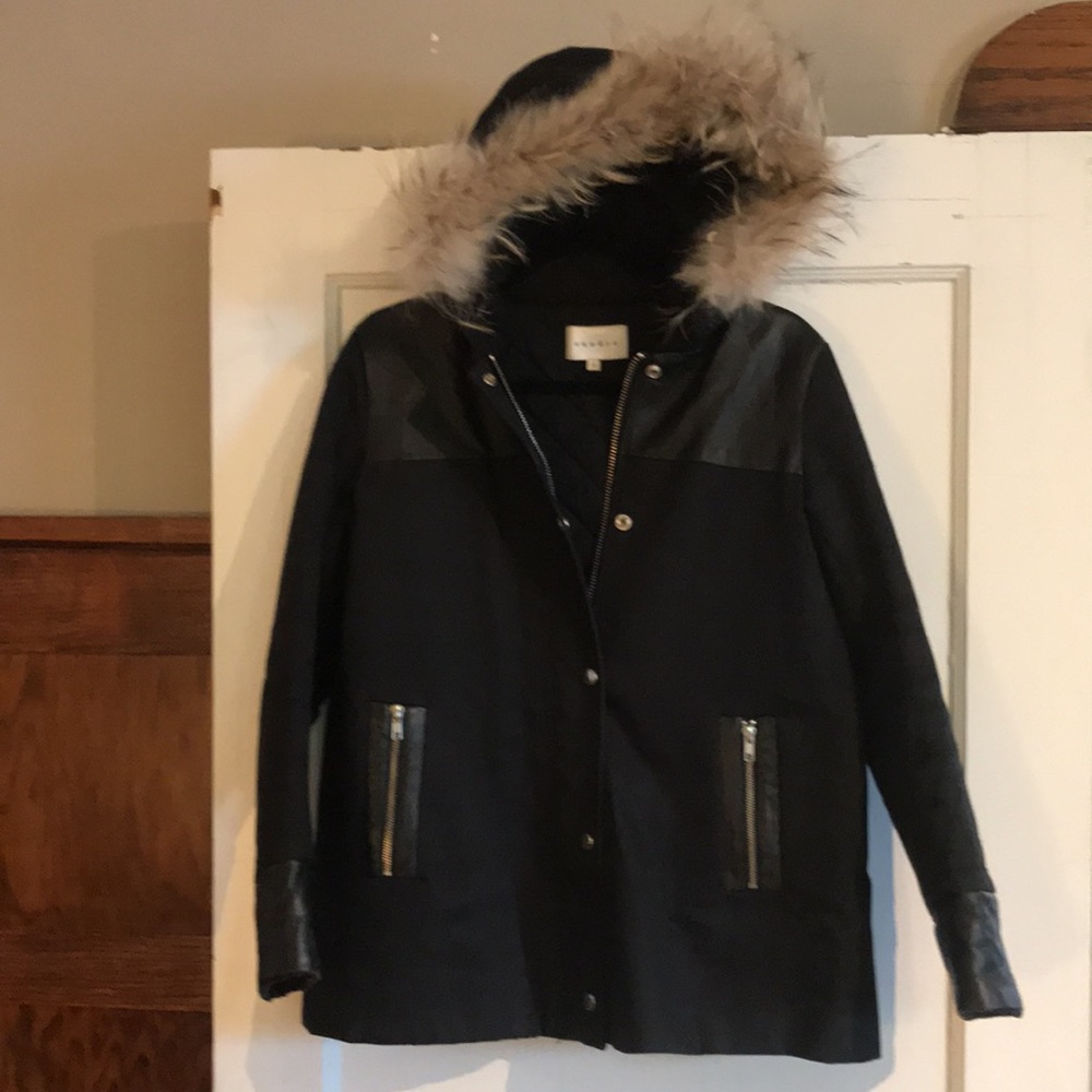 Sandro women’s fall/winter coat with fur trim around hood and leather details